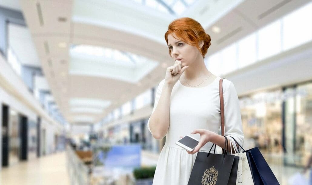 Houston shopper choosing between outlet and traditional mall
