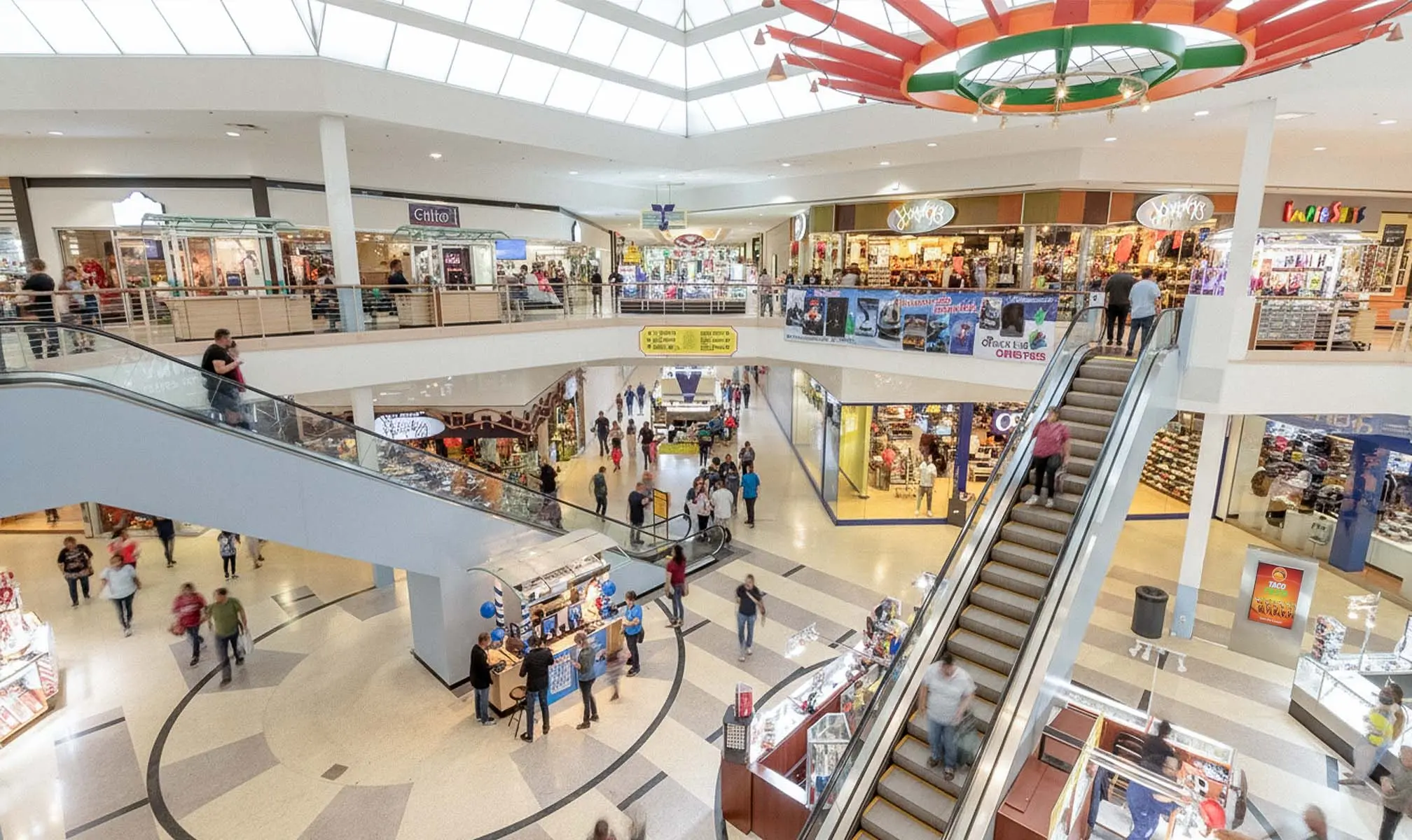 Interior stores and escalators at PlazAmericas