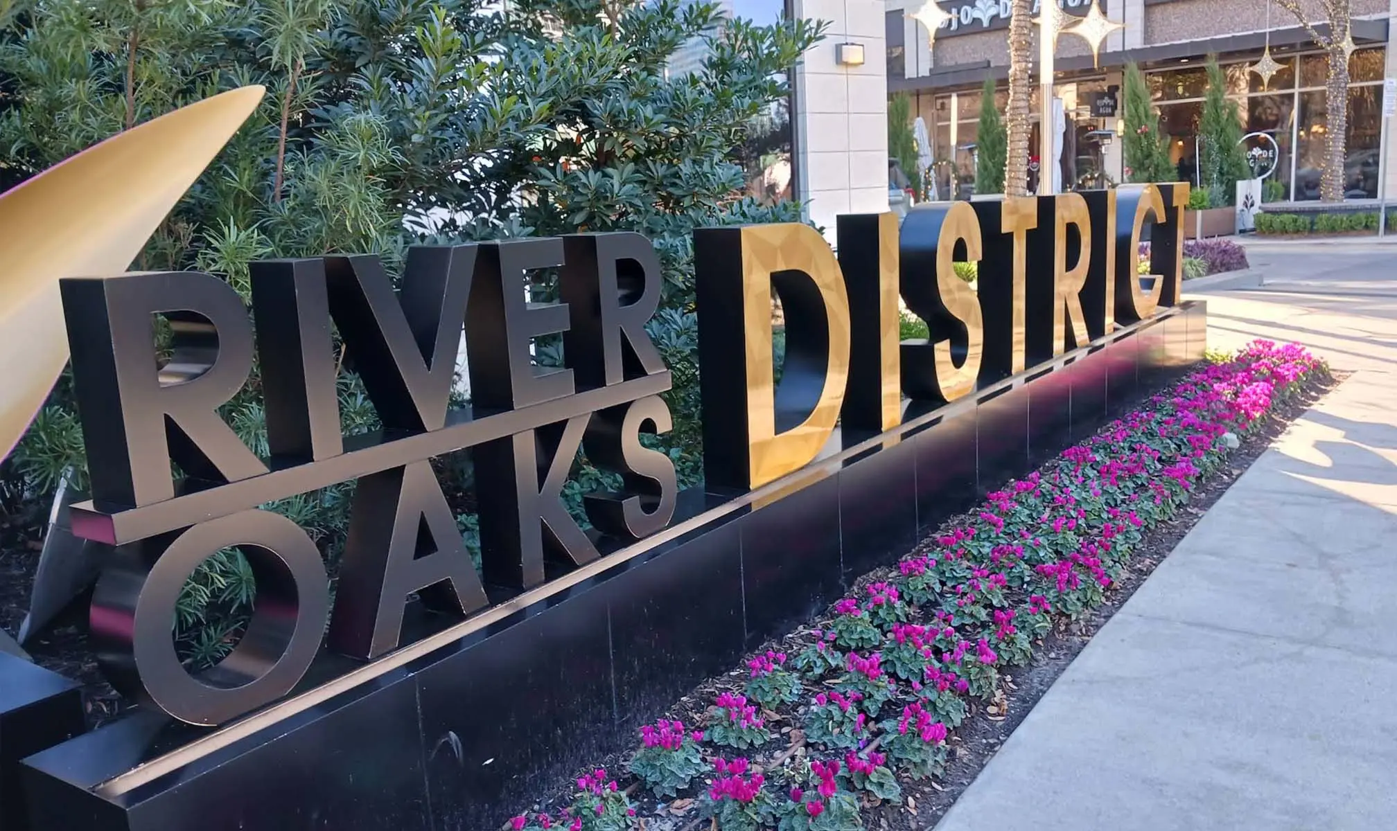 River Oaks District sign and landscaping